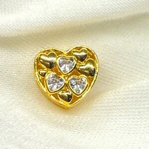 Gold Heart-Shaped Bracelet Charm with Three Heart shaped Rhinestones.